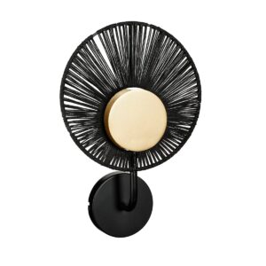 Helge Wandlamp  L26 x B12 x H39 cm  Metaal  Zwart, Goud, ECHTE BLIKVANGER De Helge wandlamp is echt een blikvanger voor in je woning! De Helge wandlamp is gemaakt van natuurlijk jute en komt in een zwarte kleur met een gouden detail in het midden. De Helge wandlamp is geschikt voor een E27 lichtbron met een maximum van 10 Watt. Hij heeft een lengte van 26 cm, een breedte van 12 cm en een hoogte van 39 cm. Waar hang jij hem op? CASA & VIVENTES Breedte: 12cm Hoogte: 39cm Lengte: 26cm Gewicht: 1490g kleuren: Zwart, Zwart Materialen: Jute, Jute merk: Mica Decorations Kijk hier voor meer wandlampen van CASA & VIVENTES