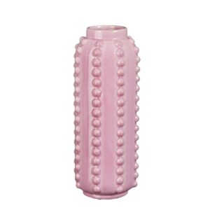 Boaz Vaas H30 x Ø11 cm Keramiek Roze Deze Boaz vaas  is een vrolijke en tegelijk een stijlvolle toevoeging aan ieder interieur. De roze vaas is gemaakt van stevig keramiek en valt op door de gebobbelde structuur aan de zijkant. De vaas is 100% handgemaakt en hierdoor uniek, een echte blikvanger! Met een hoogte van 30 cm en een diameter van 11 cm is deze vaas ideaal voor bloemen, siertakken of pluimen. Ook leuk om te combineren met meerdere gekleurde vazen of potten uit de Boaz collectie van Mica Decorations. | |Let op: Omdat dit een handgemaakt product is, kan de kleur, maat of vorm bij ieder item iets afwijken. Daarnaast zijn keramieken vazen poreus en nooit 100% waterdicht. CASA & VIVENTES Boaz Vaas H30 x Ø11 cm Keramiek Roze Breedte: 11cm Hoogte: 30cm Lengte: 11cm Diameter: 11cm Gewicht: 1170g kleuren: Roze, Roze Materialen: Keramiek, Keramiek merk: Mica Decorations