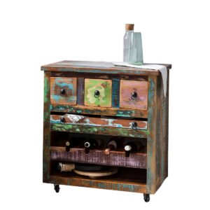 Keukenwagen Compact en slim. De combinatie van geverfd oud hout en zwart metalen beslag geeft de keukenwagen zijn rustieke charme. Met een flessenrek voor vier flessen, een open plank, een uitneembaar dienblad en drie lades is de kar een praktische hulp in de keuken of eetkamer. De trolley kan worden gebruikt als rustieke thuisbar of zorgt er dankzij de wielen voor dat flessen, glazen en accessoires gemakkelijk van de keuken naar de eetkamer kunnen worden vervoerd tijdens gezellige bijeenkomsten aan de eettafel. De keukentrolley is gemaakt van kleurrijk geverfd hergebruikt hout. Verschillende kleurgradaties en structuren maken elke auto uniek. Of het nu gaat om een ​​blikvanger in een eenvoudige sfeer of als onderdeel van een moderne inrichting in fabrieksdesign: de keukentrolley is een chique aanvulling op vele woonstijlen. De moderne materiaalmix combineert een shabby en industriële look. Lades binnenkant: 9x23,5x11 cm, bakje: 42x25x4 cm, dikte van de afdekplaat 2 cm, draagvermogen 40 kg CASA & VIVENTES Keukenwagen Breedte: 78cm Hoogte: 85cm Lengte: 48cm Gewicht: 30000.00g kleuren: Meerkleurig, Zwart Materialen: Hout, Hout, Metaal merk: SIT Möbel Im- und Export